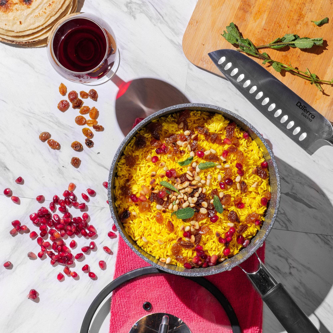 Saffron rice with pomegranate and pine nuts cooked in the DaTerra Cucina 2.6-quart saucepan