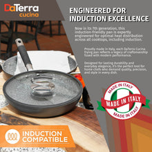 DaTerra Cucina 11-inch induction-compatible frying pan with glass lid displayed on a rustic wood table, Made in Italy seal